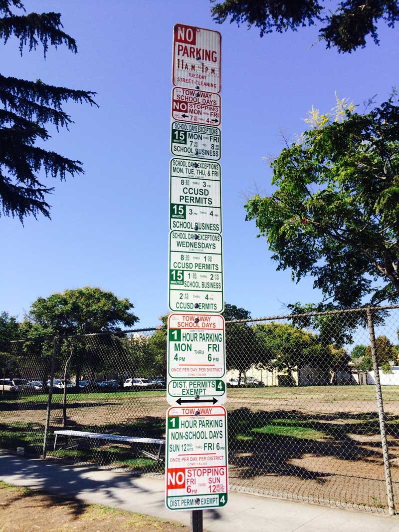 Illustration for article titled Most Ridiculous Parking Sign Ever Has Been Cut In Half, Still Ridiculous